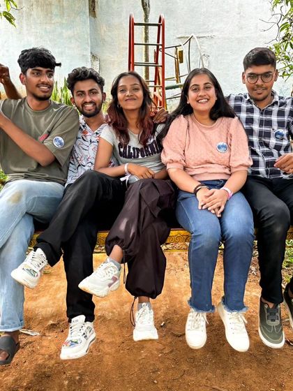Friends enjoying the swings at the resort during our Rotaract pool party.