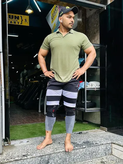A post-workout shot at the gym entrance. The feeling of accomplishment after a tough session is unbeatable.