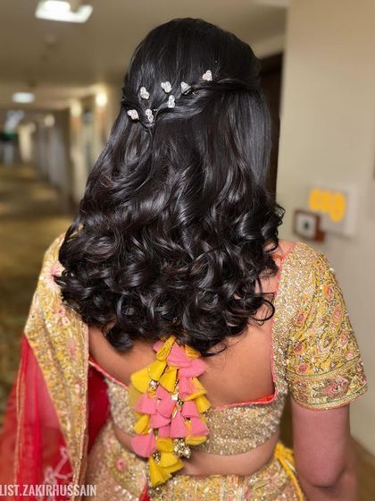 Another angle of the simple half-up style, showing the placement of the sparkling clips.