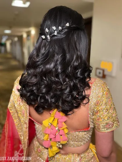 Another angle of the simple half-up style, showing the placement of the sparkling clips.