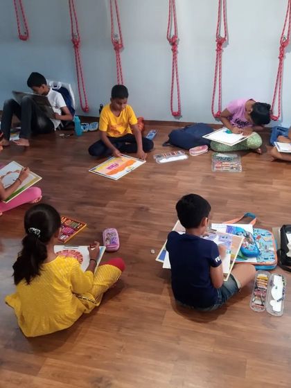 Another view of our busy classroom. I ensure each student gets the space and materials they need to practice their drawing and painting techniques effectively.