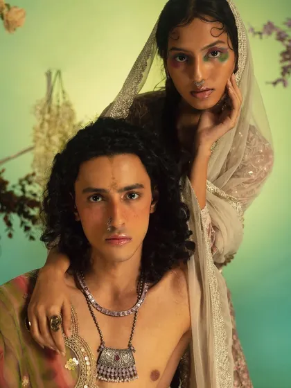 A conceptual shot featuring both male and female models. I created complementary looks, including faux freckles and subtle contouring for the male model and artistic eyeshadow for the female model.