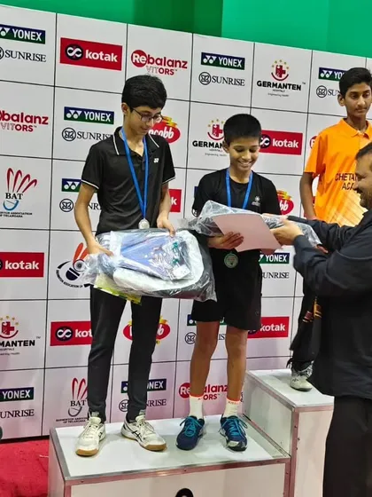 Our U-13 doubles runners-up receiving their prizes at the All India Badminton Tournament.