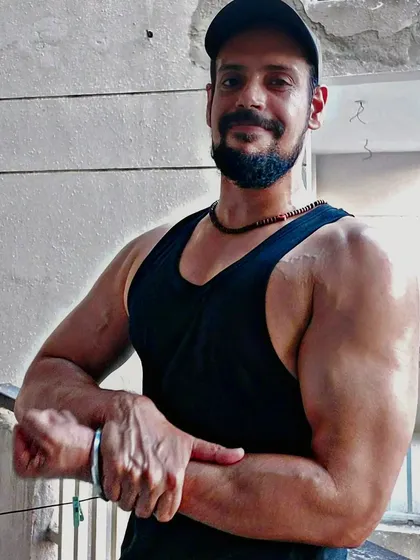 A savage mindset in the gym leads to savage results. This arm flex shows the definition and vascularity that comes from intense and focused training.