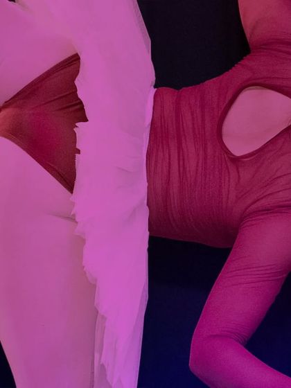 Grace and power in motion. A snapshot from a contemporary ballet piece, showcasing the technical skill and flexibility of our dancers.