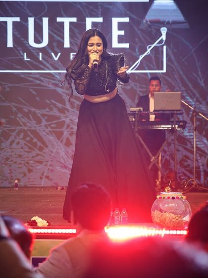Another angle from the Rotary Club show, capturing the audience's hands in the air. Getting everyone involved is my specialty, ensuring a lively and engaging event.
