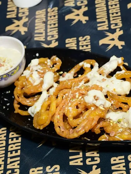 Our famous Jalebi with Rabri, a classic dessert that is always a hit. The crispy jalebis with creamy rabri is a combination you cannot miss.