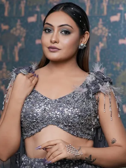 A modern and edgy makeup look perfect for a reception or cocktail party. The smokey silver eye and matte mauve lip create a sophisticated vibe that pairs beautifully with this sequined outfit.