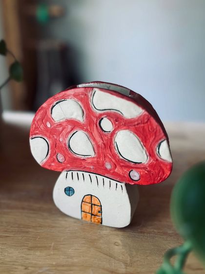 How cute is this mushroom house? This whimsical piece was made in one of our hand-building classes and is a favorite around the studio.