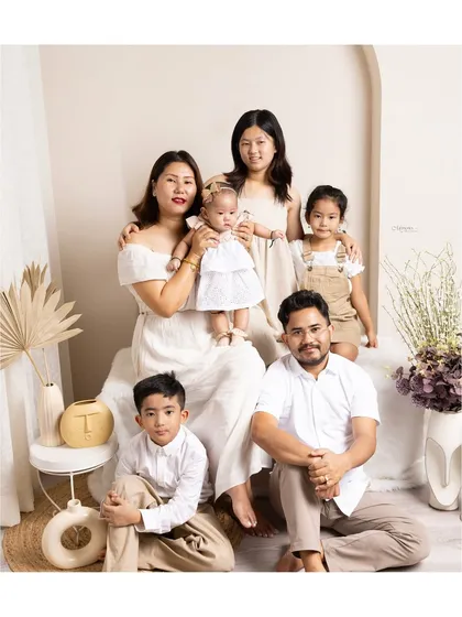 A family is a story of love, and my goal is to capture a beautiful chapter. This portrait showcases the warmth and connection of a multi-generational family, creating a true legacy heirloom.