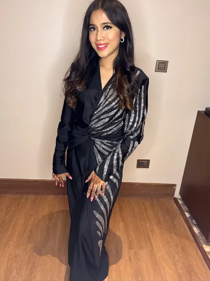 Glitz and glam for a sangeet night. This client is wearing a modern black and silver jumpsuit, and I created a chic makeup look to match.