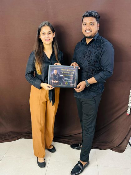 She's officially a certified hairstylist! Congratulations on this achievement.