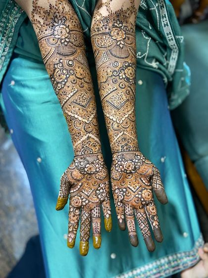 Another angle of the full bridal henna, showing how the design flows from the palm up the arm. The use of my organic henna ensures a dark and even application.