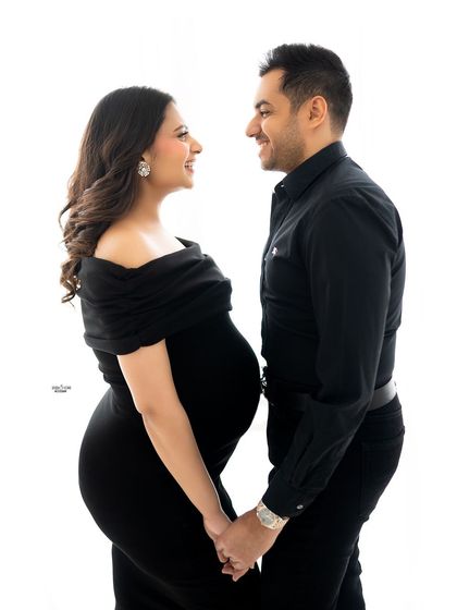 A classic high-key portrait of a couple holding hands and sharing a look of love. It’s simple, clean, and beautiful.