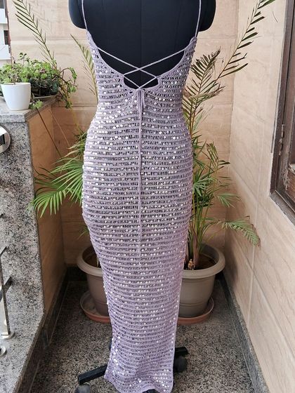 The full back view of our sequin dress, a perfect blend of handmade artistry and party-ready glamour.