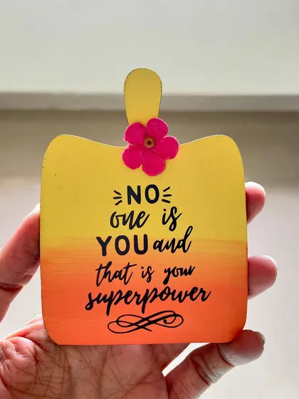 'No one is you and that is your superpower'. A chopping-board shaped magnet with an empowering message.