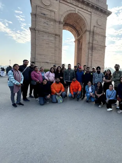 Another happy group posing in front of India Gate. It's a must-have photo for anyone exploring Delhi, and we make sure everyone gets the perfect shot.