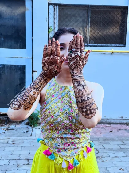 My dear niece, my baccha, on her mehandi day. It was a day of mixed emotions, with tears of joy and a heart full of love as I adorned her hands for her new life.