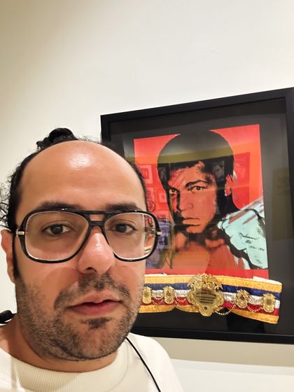 A selfie with a Muhammad Ali print by Andy Warhol. I have a genuine appreciation for art and culture, which informs the music I select for these special events.