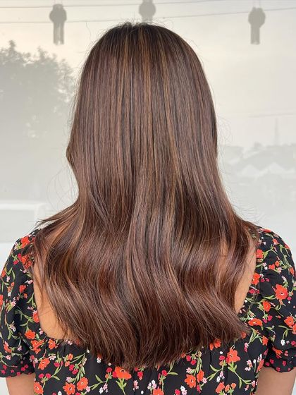 This is a beautiful mocha brown balayage created with no bleach. The result is a soft, natural-looking color with a healthy shine.