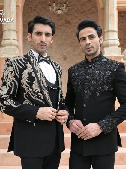 A two-shot featuring the baroque tuxedo and a black floral embroidered bandhgala, showcasing options for a groom and his best man.