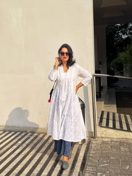 Grace and confidence in a classic white kurta. I guide clients on styling ethnic and fusion wear that feels authentic and looks polished, perfect for professional settings that value cultural roots.