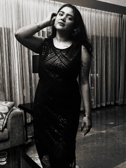 A black and white portrait used to promote "Tasveer" on Apple Music, highlighting the platform's support.