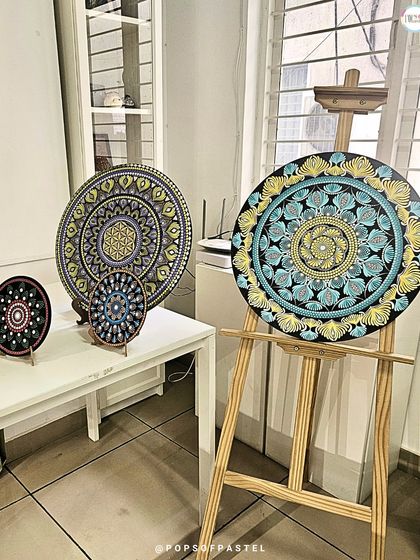 The stunning results of our dot mandala workshop. Participants learn this meditative art form and create intricate masterpieces to take home.