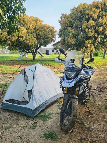 The biggest adventure is living the life of your dreams. Here, a member enjoys some tent life with his bike after a day of off-roading, combining the love for riding with the love for the great outdoors.