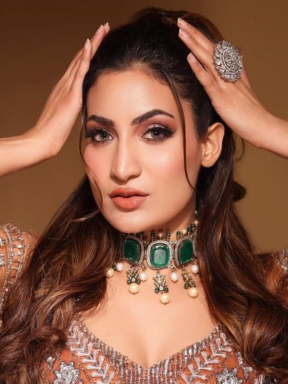 A close-up of the model, her smokey eyes and our statement choker creating a glamorous party look.