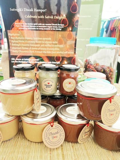 A close-up of my nut butter jars, featuring both creamy and rich chocolate varieties. These are perfect for spreading on toast, adding to smoothies, or eating right from the spoon.