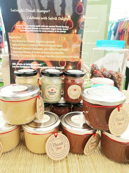 A close-up of my nut butter jars, featuring both creamy and rich chocolate varieties. These are perfect for spreading on toast, adding to smoothies, or eating right from the spoon.