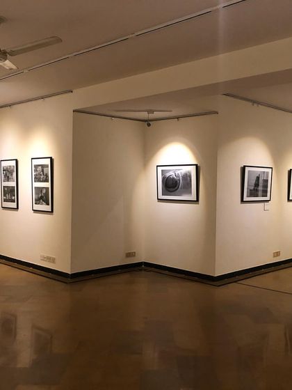 An image showcasing the architecture of our gallery space and how it complements the art. The strategic placement of photographs encourages a natural progression through the exhibition.