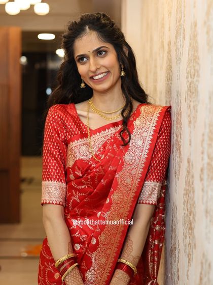 A happy and relaxed portrait of the bride-to-be. Her makeup is minimal and fresh, perfect for an engagement party, letting her natural beauty be the focus.
