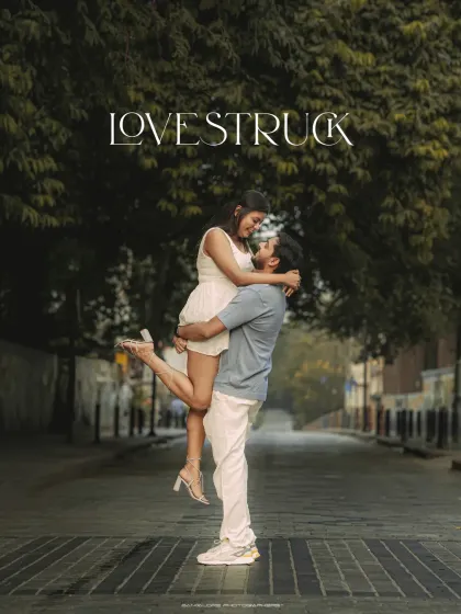 Love in the city has its own rhythm. This playful, spontaneous lift in the middle of a quiet Bangalore street captures the exhilarating feeling of being young and in love. It’s a candid, energetic moment that tells a story of joy and connection.