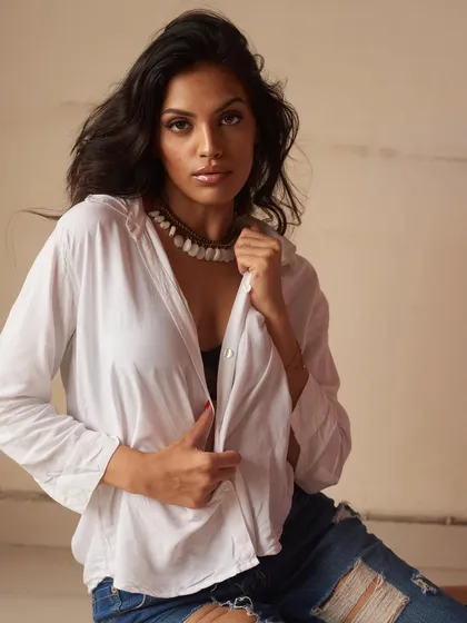 A direct-to-camera shot showcasing the minimal makeup look. It's clean, fresh, and lets the model's natural beauty take center stage.