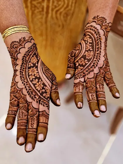 A beautiful example of an Indo-Arabic paisley (mango) motif. The design uses bold outlines filled with delicate floral patterns and fine lines.