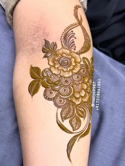 The completed floral bunch, showing the rich detail and shading. It's a perfect accent piece for any festive outfit.
