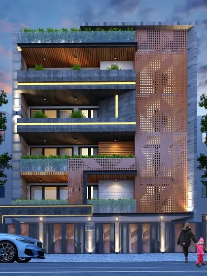 This luxury residential floor design features a perforated metal screen with a geometric pattern, adding a decorative element to the facade. The night lighting highlights the texture and creates a warm, inviting glow.