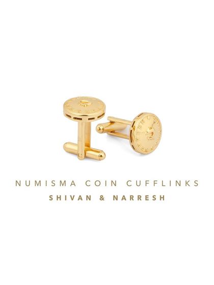 A clean product shot of the Numisma Coin Cufflinks, highlighting the intricate etching and design. These are a perfect gift for the discerning man in your life.
