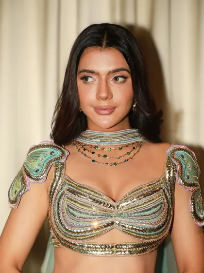 Another angle of this stunning glam look. The focus is on creating a perfect canvas so the client's natural beauty and unique outfit can shine.