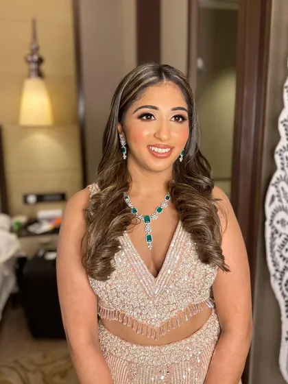 Sera's happy smile completes her glamorous party look.