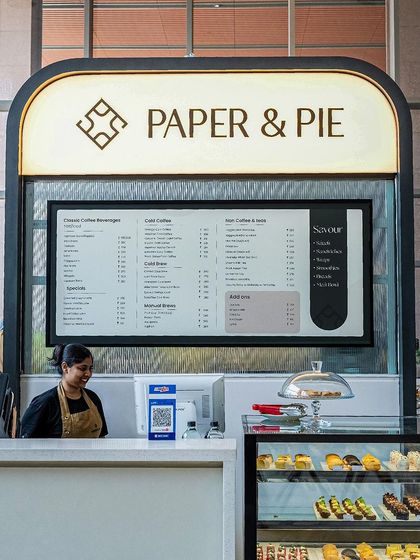 Our Bellandur kiosk, brightly lit and ready for the workday rush. The digital menu makes ordering quick and easy.