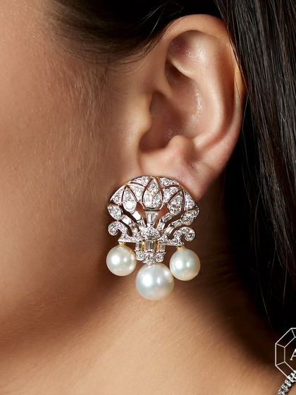 These luxurious earrings with diamonds and pearls are a reminder of your worth and a celebration of your value.