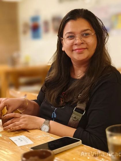 Our pottery date workshops are a perfect way to connect with a loved one. This participant is enjoying a creative session, learning to make pottery in a relaxed and fun atmosphere.