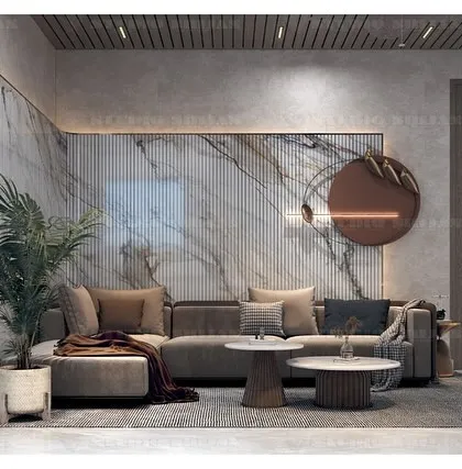 A lobby in Kirti Nagar, New Delhi, where I used a mix of concrete-finish walls, a marble accent, and warm wood tones to create a sophisticated, industrial-luxe feel.