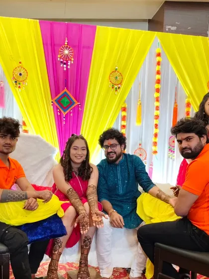 Here is our team with a happy bride and groom. We come to your location and become a part of your celebration, ensuring the mehandi ceremony is smooth, fun, and memorable for everyone.