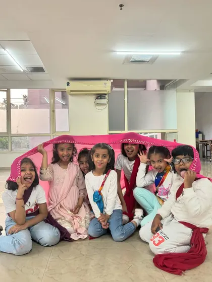 My little rascals hiding under a dupatta during our Holi-themed dance class. It’s these playful moments that make teaching kids so special.