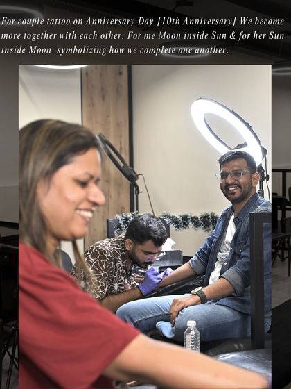 "For me Moon inside Sun & for her Sun inside Moon symbolizing how we complete one another." A husband and wife getting their anniversary tattoos together.