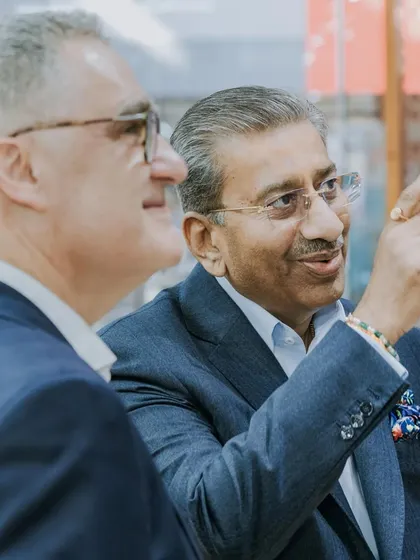 A candid moment of discussion and presentation during the Scabal event. It is through these close relationships with fabric makers that we ensure the superior quality of every garment we produce.